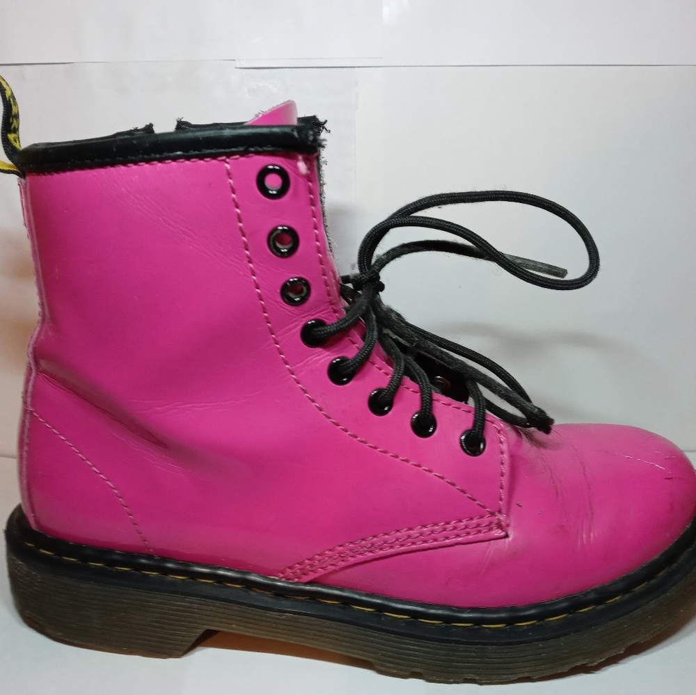 Girls Pink Doc Marten 8 hole boots.